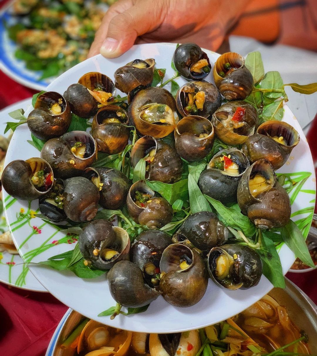 Cẩm nang du lịch Cần Thơ chi tiết từ A - Z 89 Khám phá đặc sản Ốc bươu nướng tiêu xanh Cần Thơ cực thơm ngon